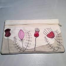 Spring frolic sheep zipper bag machine embroidery tutorial. Ith Bag Pouch In The Hoop Zipper Bag From The Beach Etsy Machine Embroidery Zipper Bags Machine Embroidery Designs