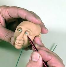 A PFDVD Sculpt Using Puzzle-face Push Molds by Maureen Carlson. It's a  Great Tool for Polymer Clay Users.