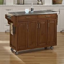 The result is a functional workstation where you can store your. Home Styles Brown Wood Base With Stainless Steel Metal Top Kitchen Cart 17 75 In X 48 In X 35 5 In In The Kitchen Islands Carts Department At Lowes Com
