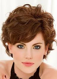 This hairdo has bangs, which will add volume and make the brow look smaller. Wavy Hair With Side Swept Bangs Fine Curly Hair Short Hair Styles Short Curly Hairstyles For Women