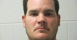 Jailed without bond after being charged with threat of arson