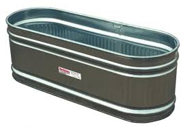 Garden pest controls, garden bird repellents Steal This Look Water Troughs As Raised Garden Beds Gardenista Livestock Water Trough Water Troughs Stock Tank
