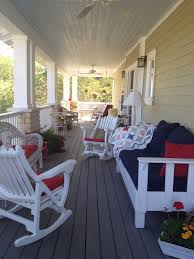 Picturesque White Wooden Rocking Chairs And Cool White Wooden Long Chair With Dark Blue Seat And Red Cushions As Ama Porch Furniture Porch Furniture Sets Porch