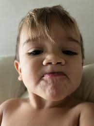 I love finding pictures like this. Our second oldest was hanging out with  our youngest and taking some fun pictures.