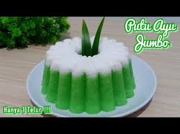 Kue putu ayu sebenarnya merupakan hasil kreasi para ibu ibu masa kini, sebab sebelumnya kita hanya mengenal kue putu tepung beras yang berwarna putih menarik yang di dalamnya berisi gula merah sisir. Cara Membuat Putu Ayu Jumbo Hanya 1 Telur Enak Dan Lembut Banget Youtube