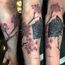 Black And Grey Flower Tattoos With Color Black Rose And Cherry Blossom Cherry Blossom Tattoo Blossom Tattoo Flower Tattoo Shoulder