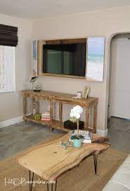 The tv cabinet hangs solidly on the wall, thanks to a hidden construction. Diy Wall Mounted Tv Cabinet With Free Plans H2obungalow