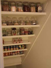 Add in fluffy pillows and a lamp and it's the ultimate reading spot. Under The Stairs Spice Rack Made Simply From Angled Shelves How To Use An Under The Stairs Storag Under Stairs Pantry Closet Under Stairs Understairs Storage