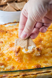 Preheat oven to 350 degrees and grease a 9″ pie dish. Mom S Famous Buffalo Chicken Dip Bread Booze Bacon