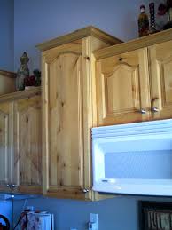 refinished knotty alderwood cabinets