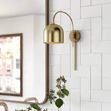 Sconces are excellent light sources in that they created the ambiance many consumers prefer with lamps , as compared to overhead lighting, without taking up any floor or table space. Wade Logan Karlie 1 Light Plug In Armed Sconce Reviews Wayfair
