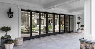 Thinking about installing a glass garage door? Open Your Home To The Outdoors With A Movable Glass Wall