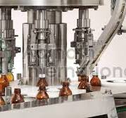 Features & Applications of Bottle Screw Capping Machines