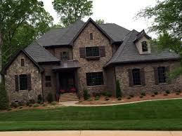 Or in an industrial and urban exposed brick design; Antique Bronze With Metal Roof Red Brick House Vtwctr