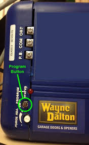 program button on a wayne dalton prodrive classic drive and quantum unit located below the terminal wayne dalton garage doors wayne dalton garage door parts