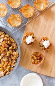 Plus, if you're usually afraid to roll out dough like this, read the instructions and you'll find that there are tricks to the trade that really make it really easy. Wonton Apple Pies Carmy Run Eat Travel