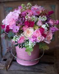 Floral Arrangement With Pink And Purple Flowers In Pink Pail Or Bucket Flower Arrangements Beautiful Flower Arrangements Flowers