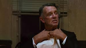 Hayden is the crooked cop who learns that having pasta with michael corleone is a bad idea. The Godfather 1972