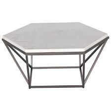 It lets you create a warm and inviting look with your favorite decor, collectibles, potted plants etc. Steve Silver Corvus Contemporary Cocktail Table With Hexagonal White Marble Top Lagniappe Home Store Cocktail Coffee Tables