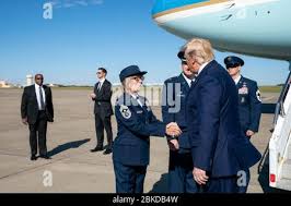 President Donald J. Trump is greeted by U.S. Air Force personnel Col. Brian  Lehew and CMSgt. Judith McGrath after disembarks Air Force One Wednesday,  Oct. 21, 2019, at Pittsburgh International Airport in