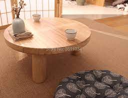 It has a smooth, gray laminate top and black metal, open frame legs. Japanese Style Burlywood Color Round Table Paulownia Wood Traditional Asian Furniture Living Room Low Floor Coffee Table Wooden Coffee Tables Aliexpress