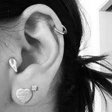 Tragus Piercing And Hoop Cartilage Love It Ear Piercings Tragus Piercing Tattoo Piercings
