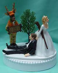 Check spelling or type a new query. 50 Funniest Wedding Cake Toppers That Ll Make You Smile Pictures Pouted Com Hunting Wedding Cake Toppers Hunting Wedding Cake Funny Wedding Cakes