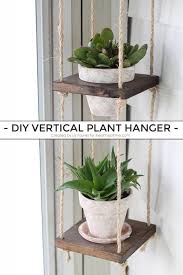 At this point, you could paint or stain, and i would recommend one or the other to give some outdoor weather protection to your new diy outdoor planter box for hanging string lighting. 21 Diy Hanging Planters You Can Make Make And Takes