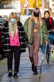 Collection with 3533 high quality pics. Heidi Klum Showcases Her Washboard Abs In Pink Cheetah Print Gymwear Daily Mail Online