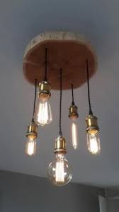 afbeeldingsresultaat voor schijf boomstam lamp rustieke kroonluchter rustieke verlichting rustiek meubilair