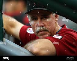 Houston Astros coach Phil Garner looks out from the dugout in the fifth  inning against the Detroit Tigers at Comerica Park in Detroit, Mi