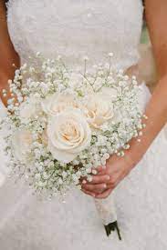 Baby's breath, or to give it it's proper name, gypsophila, has always been known throughout the floral world as a cheap filler bloom and appeared in almost every bouquet throughout the years, but in the last year or so, it has made a massive comeback as a wedding flower and is now very much the main attraction. Tish S Bridal Bouquet Babys Breath Bouquet Wedding Flower Bouquet Wedding Wedding Bouquets