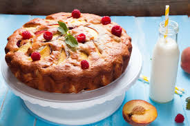 Clafoutis Aux Peches Et Framboises Un Delicieux Gateau D Ete Recettes Gateau Dessert Clafoutis Peche Recettes De Cuisine Desserts Aux Fruits