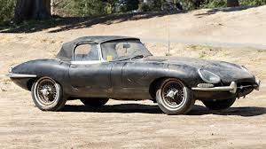 A scene from an unlocked window (image via cbs). 1965 Jaguar E Type With Just 8 000 Miles Is Headed To Auction