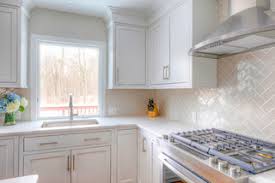 But, now i am white and gray kitchen features white cabinets paired with new macabus white quartzite countertops and a white and gray herringbone tile backsplash, ann. Gray Herringbone Backsplash Transitional Kitchen New York By Kraftmaster Renovations Houzz Ie
