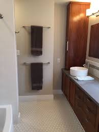 Only Unused Wall In The Bathroom So Stacked The Towel Bars Matte White Hexagon Tile Floor With Light Gray Gr Bathroom Towel Bar Small Bathroom Trendy Bathroom