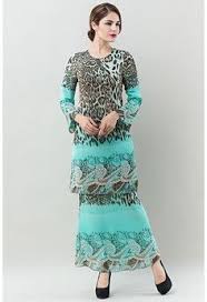 If one's wearing a kain dagang, instead of wearing a long scarf, they usually opt for a traditional veil such as. 34 Kurung Sari Laces Ideas Sari Lace Fashion
