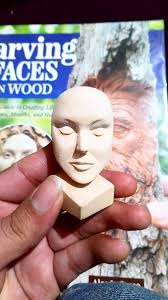 Hand-carved Santa figures with unique color schemes