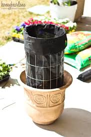 Make beautiful flower tower pots. How To Make A Flower Tower Honeybear Lane