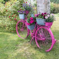 Upcycled bikes are not usual garden decor but try something new. 33 Bicycle Flower Planters For The Garden Or Yard Diy Garden Decor Flower Planters Bicycle Decor