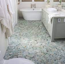 This is our natural river rock counter for our rustic , nature like half bath off our family room. How To Use River Pebbles For Home Decor 15 Ideas Shelterness