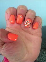 Orange nails with black rays design nail art. Pin By Ashley Depasquale On Nails Bright Orange Nails Orange Nails Holiday Nails