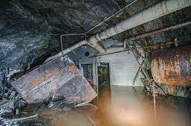 A Flooded Underground Factory In Sweden It Used To Make Large Steel Cables It Was Built Underground To Protect It From In 2020 Underground Abandoned Places Building