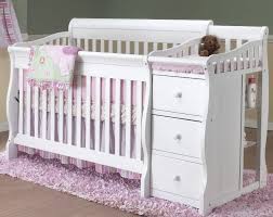 All baby cribs sold today must meet modern safety standards, including fixed sides and mandated slat width. Oval Cribs For Babies Today S Baby Beds Do Far More Than Serve Yours And Baby S Needs Crib And Changing Table Combo Crib With Changing Table Convertible Crib