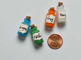 Touch device users, explore by touch or with swipe gestures. Mini Magic Potion Bottles Organized 31