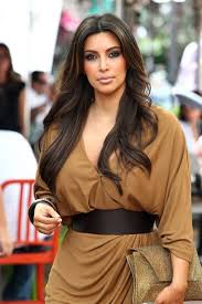 Kim Kardashian Makes The Most Of Her Curves By Accentuating The Narrowest Part Of Her Waist With A Wide Be Kardashian Hair Kim Kardashian Hair Long Hair Styles
