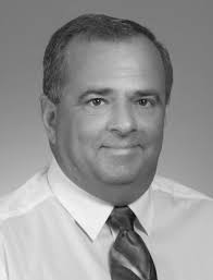 Man charged with threatening cop, choking wife