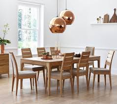 The Stylish Romana Oak Dining Table Features A Beautiful Curved Edge Detail To The Long Sides Of Th Oak Dining Chairs Fabric Dining Chairs Wooden Dining Tables