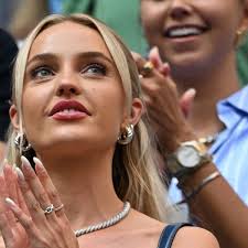 Taylor Fritz's gf Morgan Riddle steals Wimbledon spotlight in strawberry  pink fit