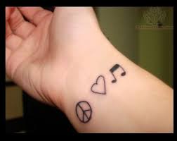 Peace Love And Music Wrist Tattoo Peace Tattoos Love Music Tattoo Hand Tattoos